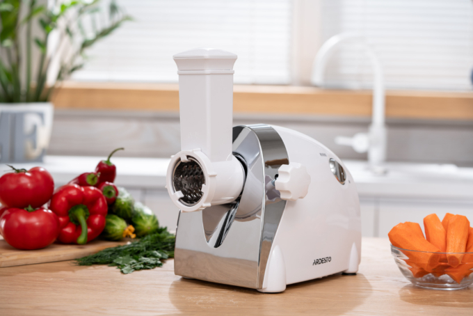 Meat grinder Ardesto, 2000W, prod.-1.9kg/min, 3 cutting plates+for sausag.plates, 3 vegetable slicer, plastik, black-silver
