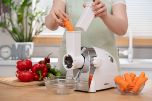 Meat grinder Ardesto, 2000W, prod.-1.9kg/min, 3 cutting plates+for sausag.plates, 3 vegetable slicer, plastik, black-silver