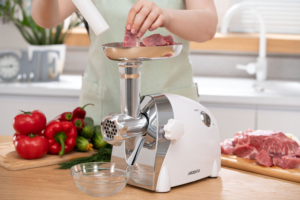 Meat grinder Ardesto, 2000W, prod.-1.9kg/min, 3 cutting plates+for sausag.plates, 3 vegetable slicer, plastik, black-silver