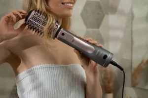 Ardesto Hair Dryer Brush Pink Touch, 1200W, 2 speeds, 2 temperature settings, ionization, LED-display, 4 attachments, gray+pink