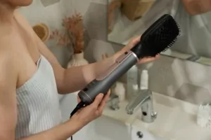 Ardesto Hair Dryer Brush Pink Touch, 1200W, 2 speeds, 2 temperature settings, ionization, LED-display, 4 attachments, gray+pink