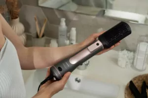 Ardesto Hair Dryer Brush Pink Touch, 1200W, 2 speeds, 2 temperature settings, ionization, LED-display, 4 attachments, gray+pink